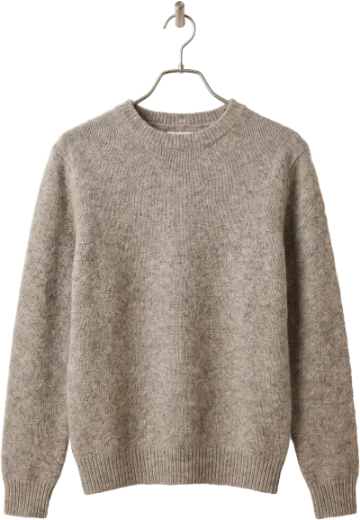 An oatmeal sweater on the rail